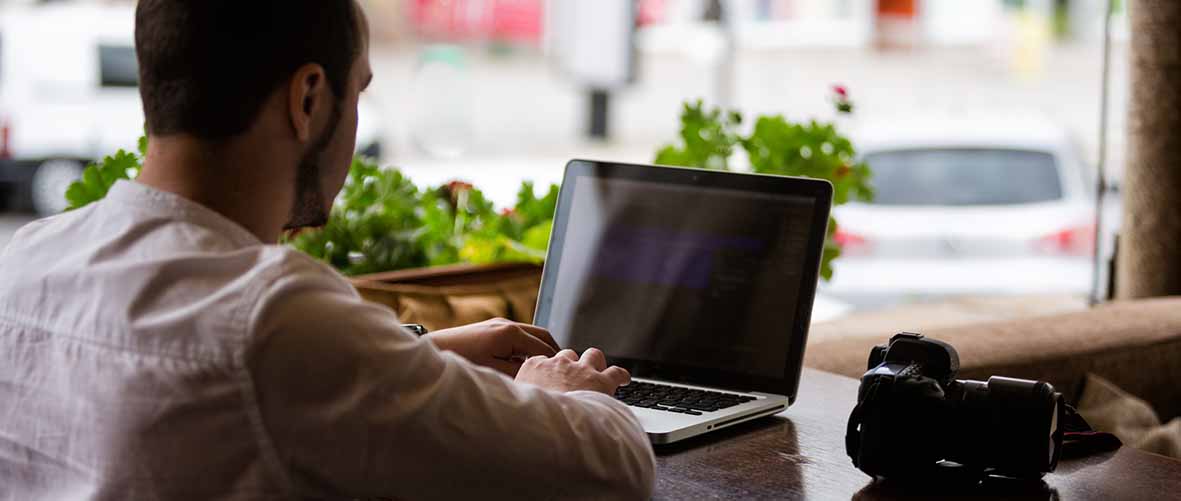 graduate using the laptop