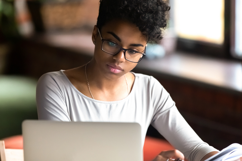 woman looking at computer